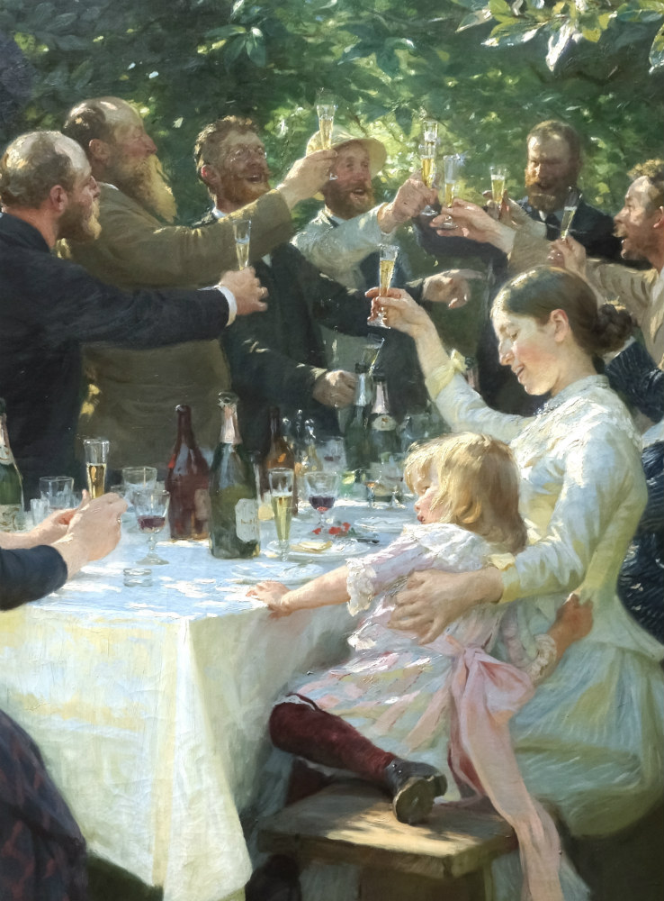 Maleri af en række mandlige kunstnere samt en kvinde og et barn, der alle står om et bord og skåler