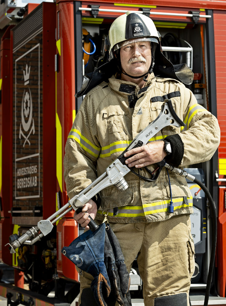 Brandmand med brandslukker